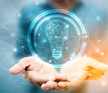 Graphic processing of two hands supporting a stylized light bulb