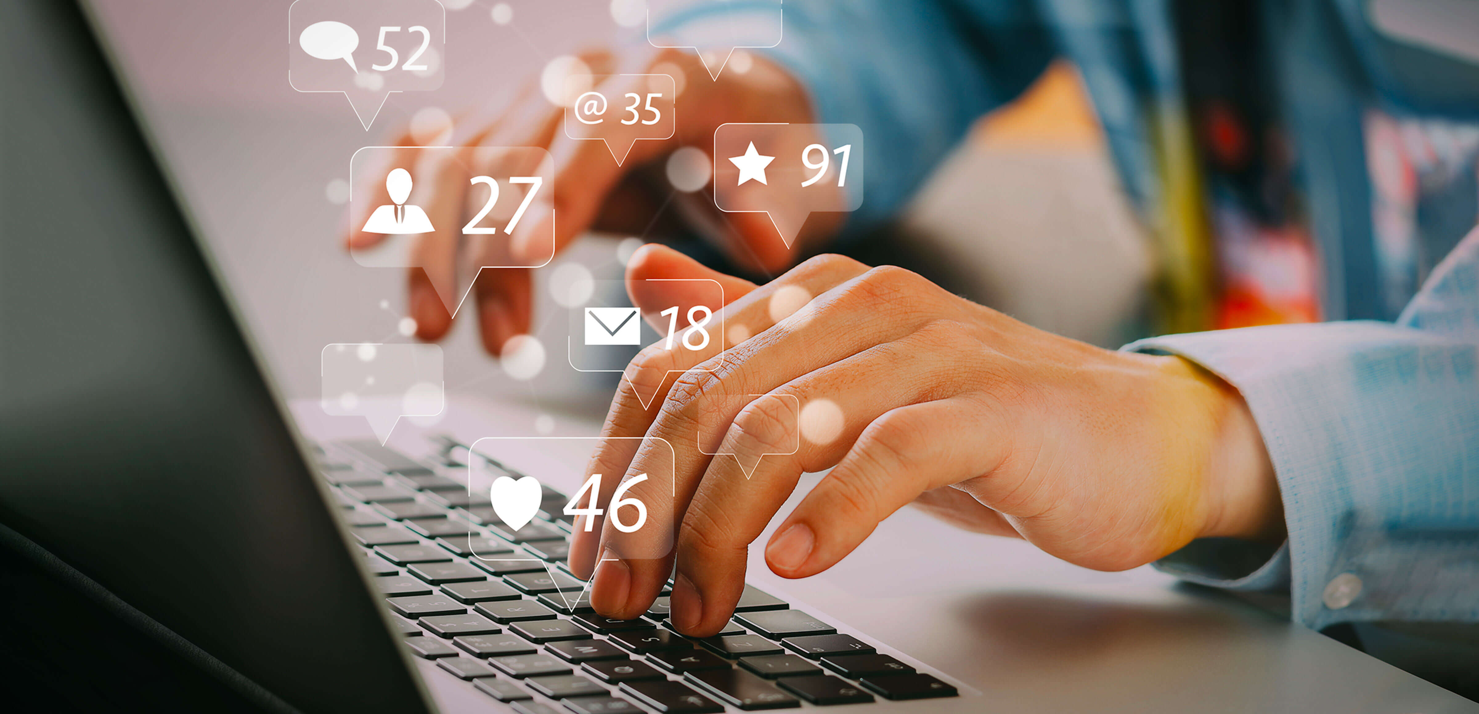 hands typing on keyboard with social media emoticons and white numbers | openinnovability.enel.com